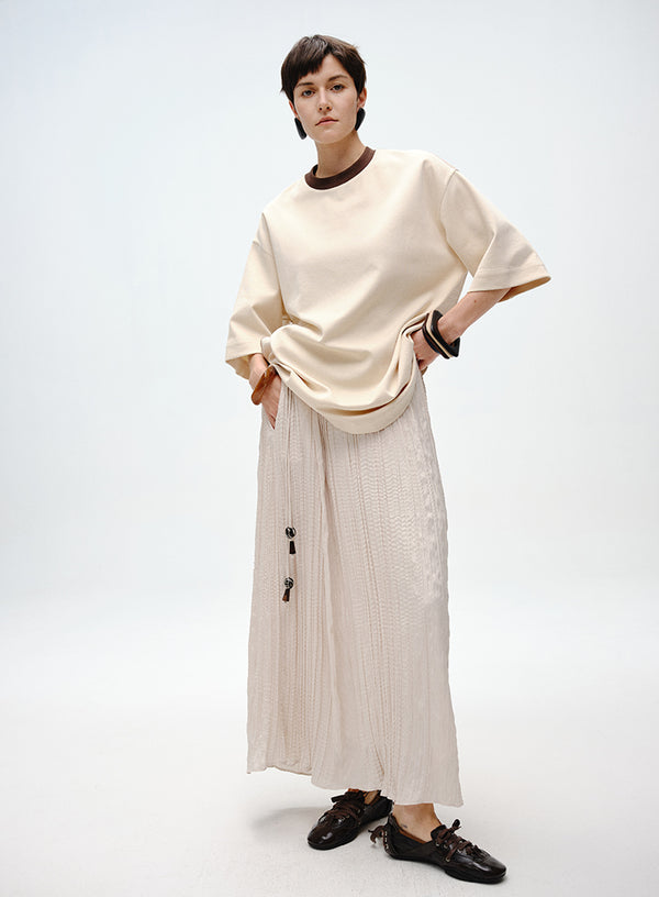 Pleated Skirt with Wooden Pendant