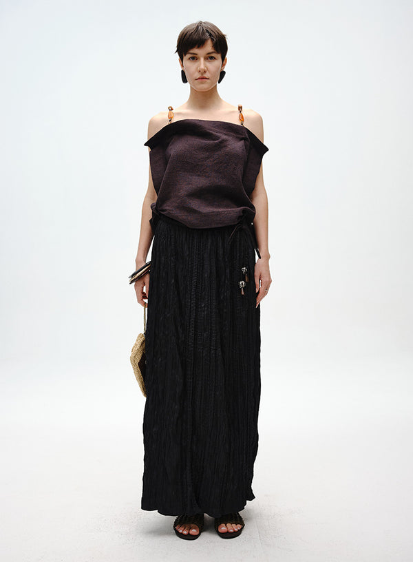 Pleated Skirt with Wooden Pendant