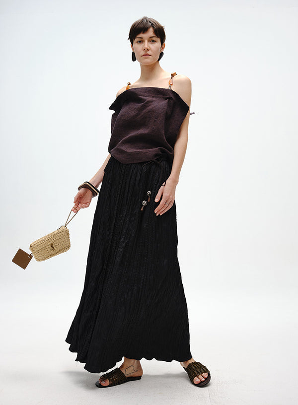 Pleated Skirt with Wooden Pendant