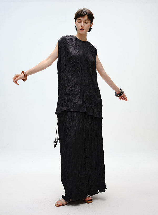 Pleated Skirt with Wooden Pendant