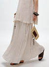 Pleated Skirt with Wooden Pendant