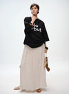 Pleated Skirt with Wooden Pendant
